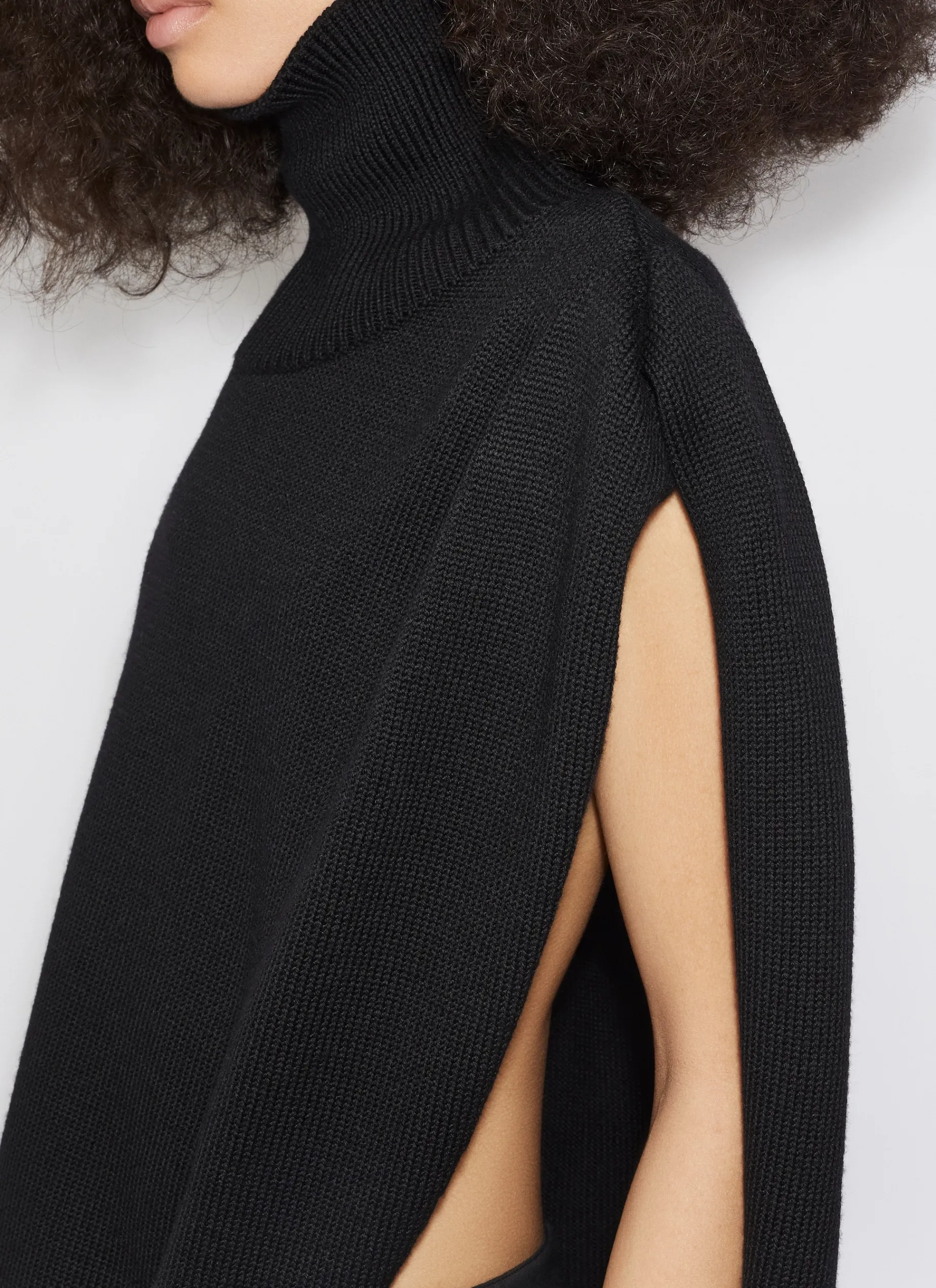 KNITTED ASYMMETRICAL CAPE JUMPER