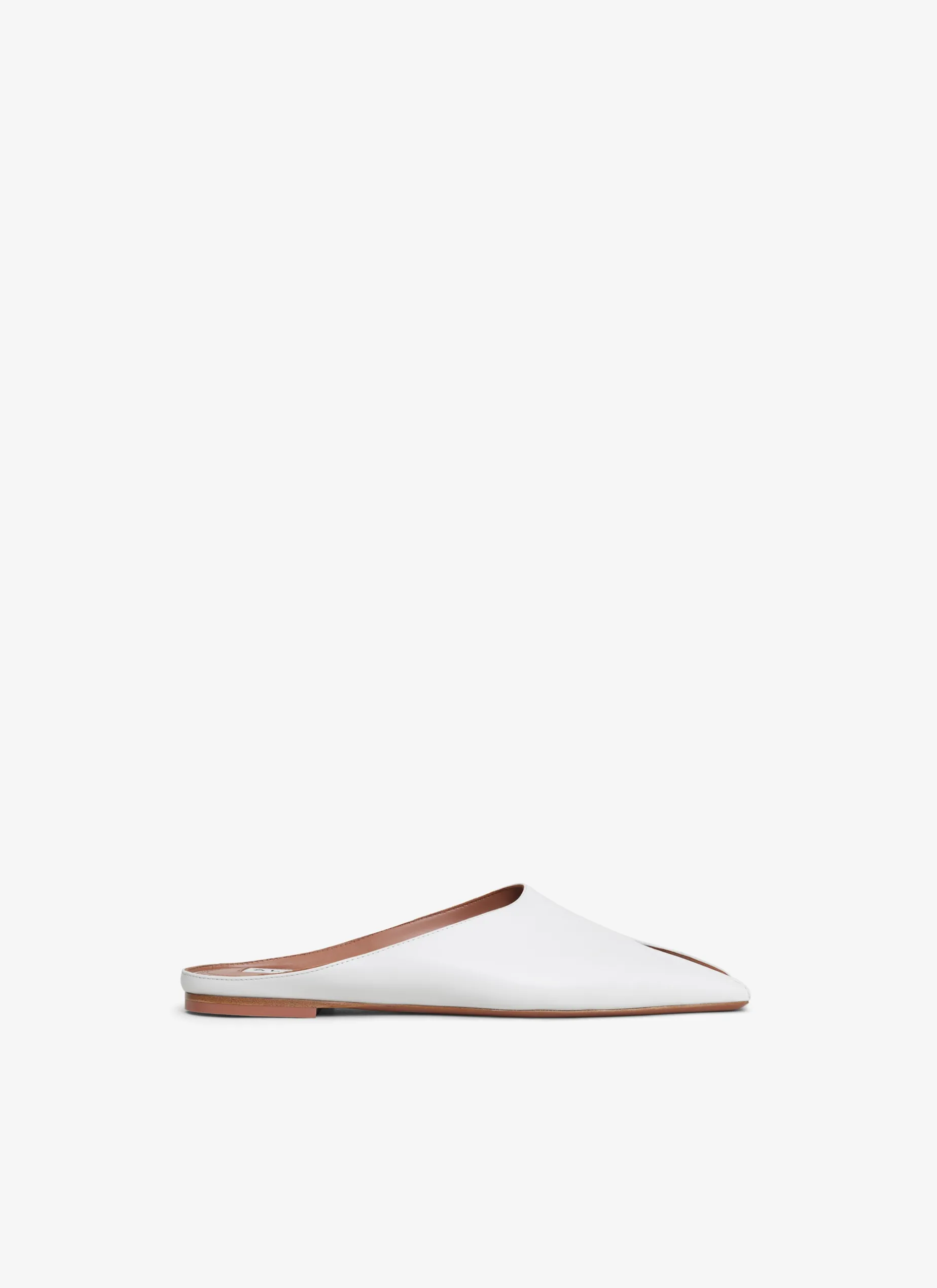 SPIKE FLAT MULES IN CALFSKIN