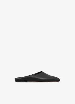 SPIKE FLAT MULES IN CALFSKIN